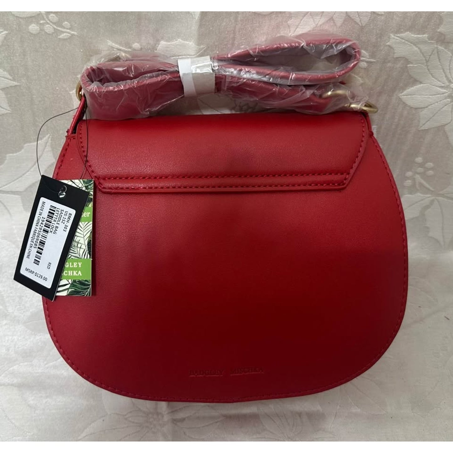 Badgley Mischka Red Saddle Bag with gold accents. B142-6050