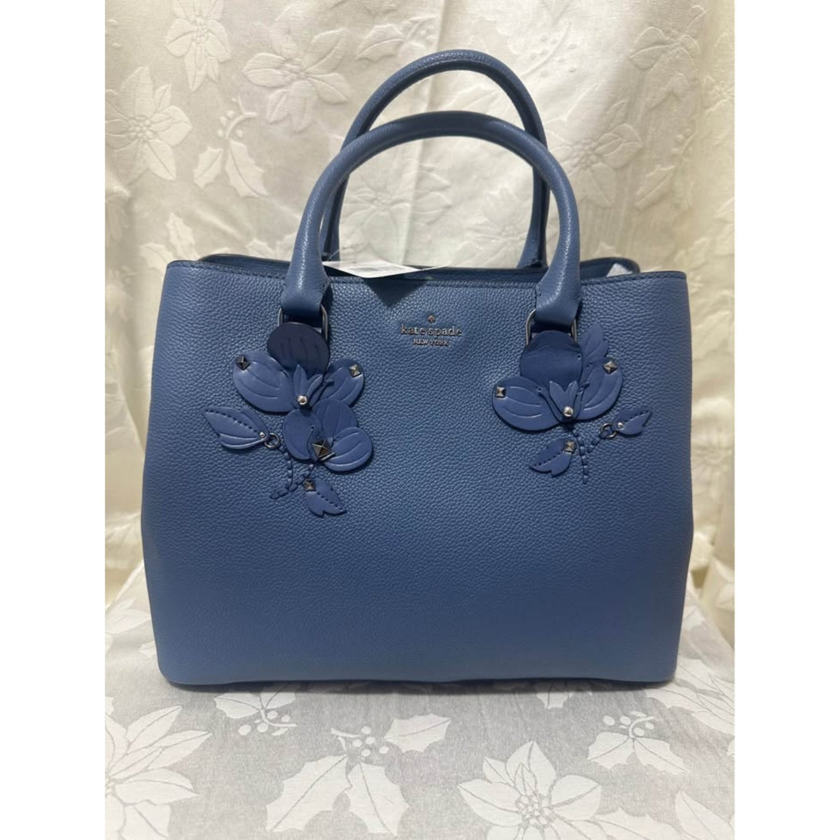New Kate Spade Blue Pebbled Leather Handbag with Floral Appliques. B-283