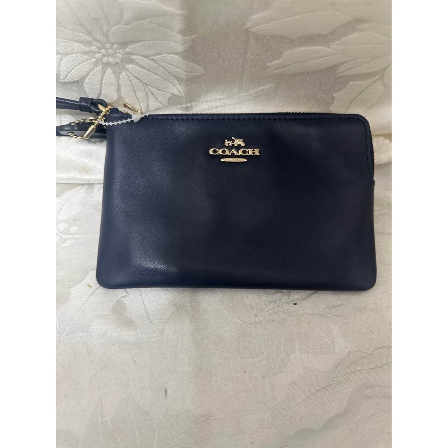 New Coach navy leather wristlet. B-304