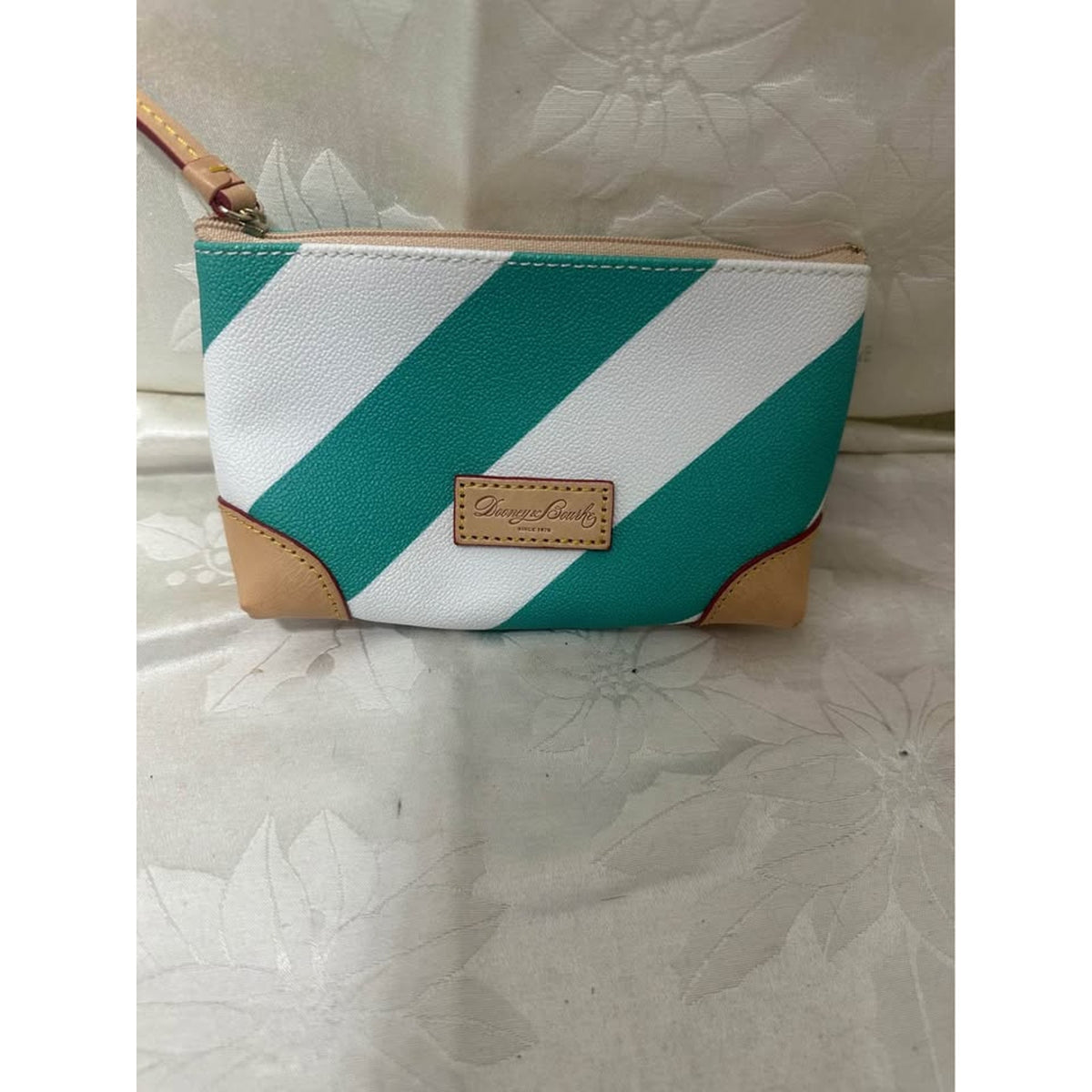 New Dooney & Bourke white and teal striped pouch. B-299