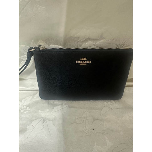 Pre-loved Coach Black Pebbled Leather Wristlet. B-303