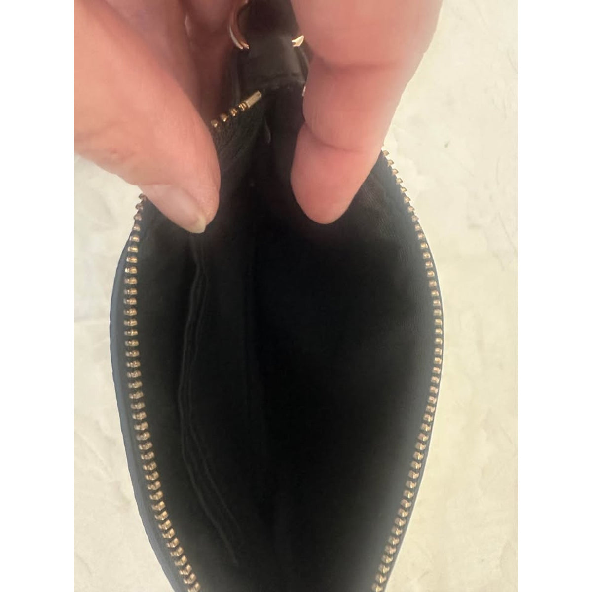 Pre-loved Coach Black Pebbled Leather Wristlet. B-303