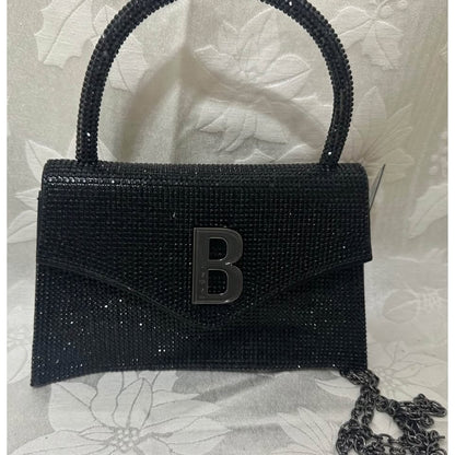 bebe Black Top Handle mini bag. B143