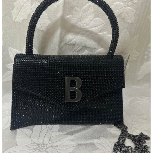 bebe Black Top Handle mini bag. B143