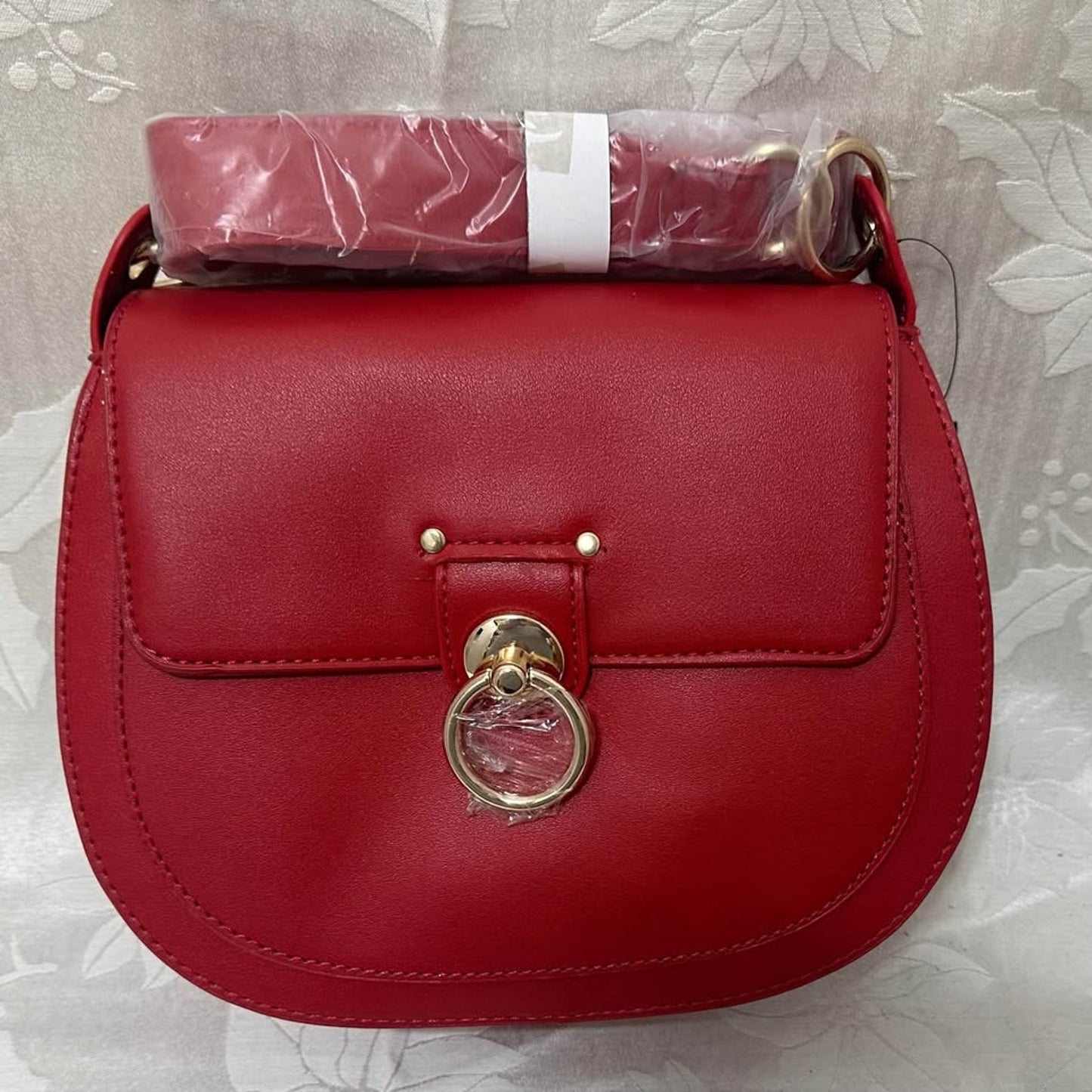 Badgley Mischka Red Saddle Bag with gold accents. B142-6050